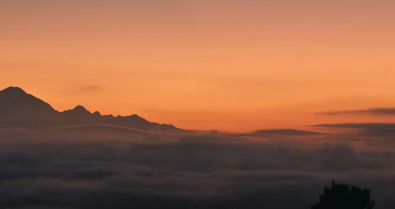The Himalaya above a sea of cloud at sunrise